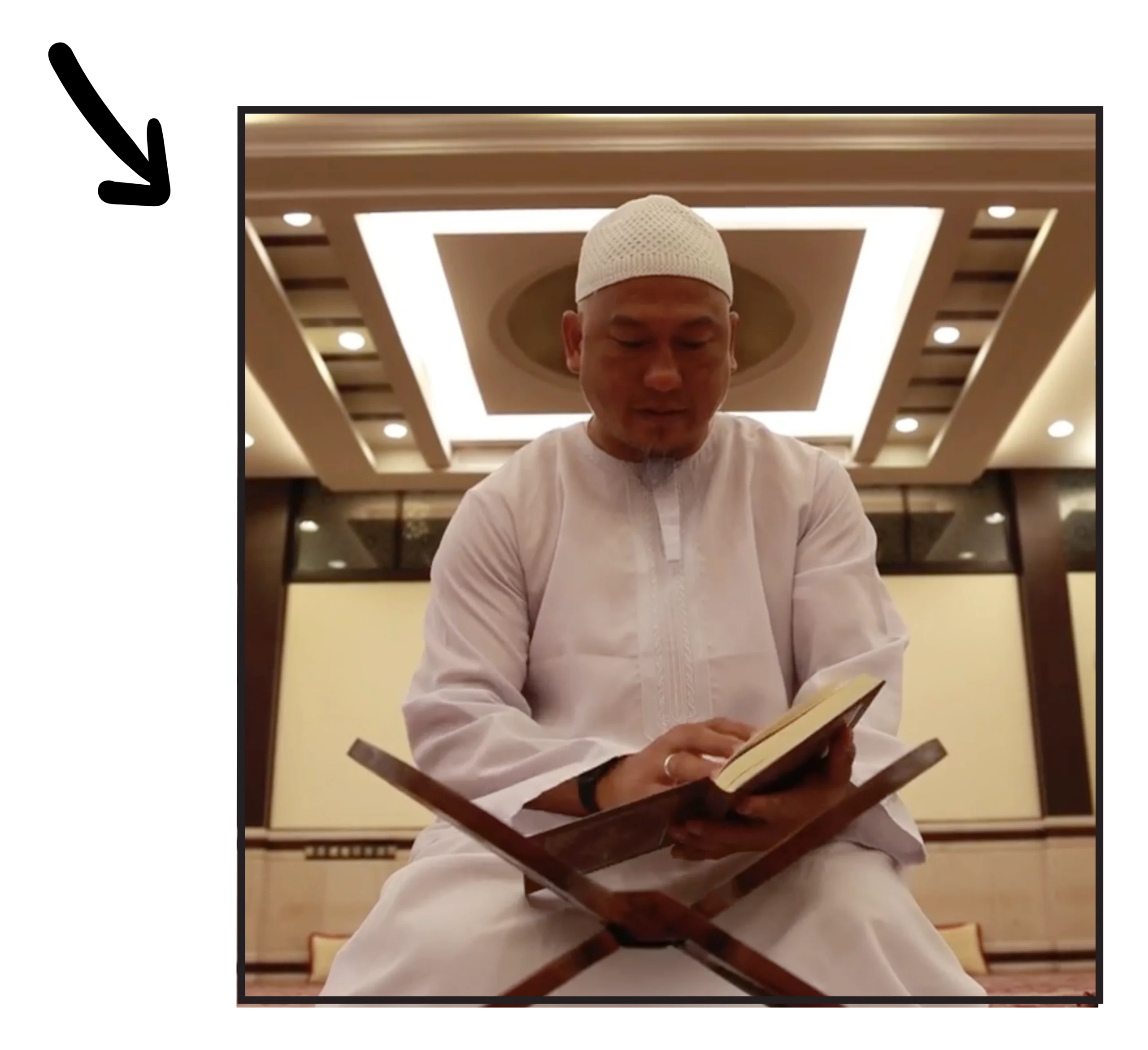 Scholar reading Quran